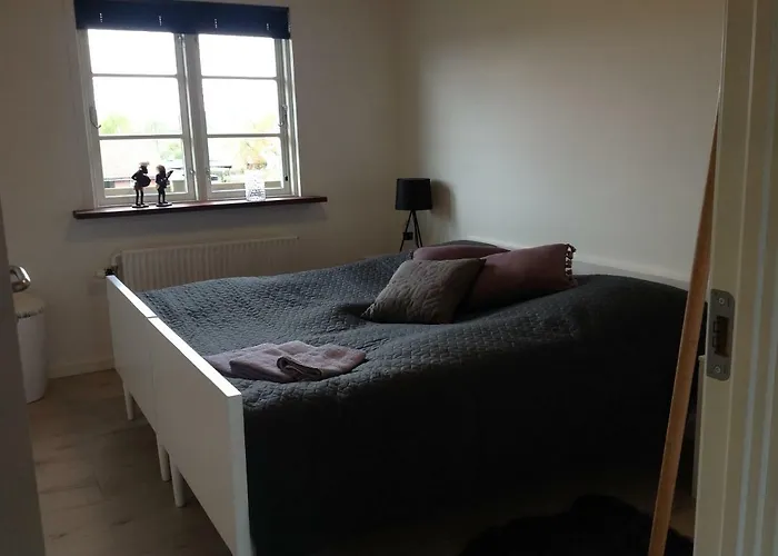 Holiday home Ny Istandsat Traehus I Givskud Give